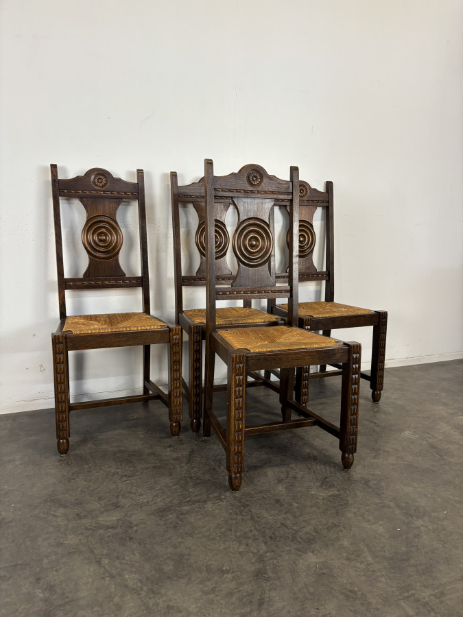 Série de 5 chaises style Charles Dudouyt paillées