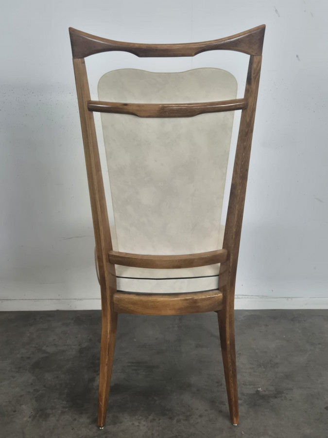 Série de 6 chaises années 50 à haut dossier, garniture skaï crème