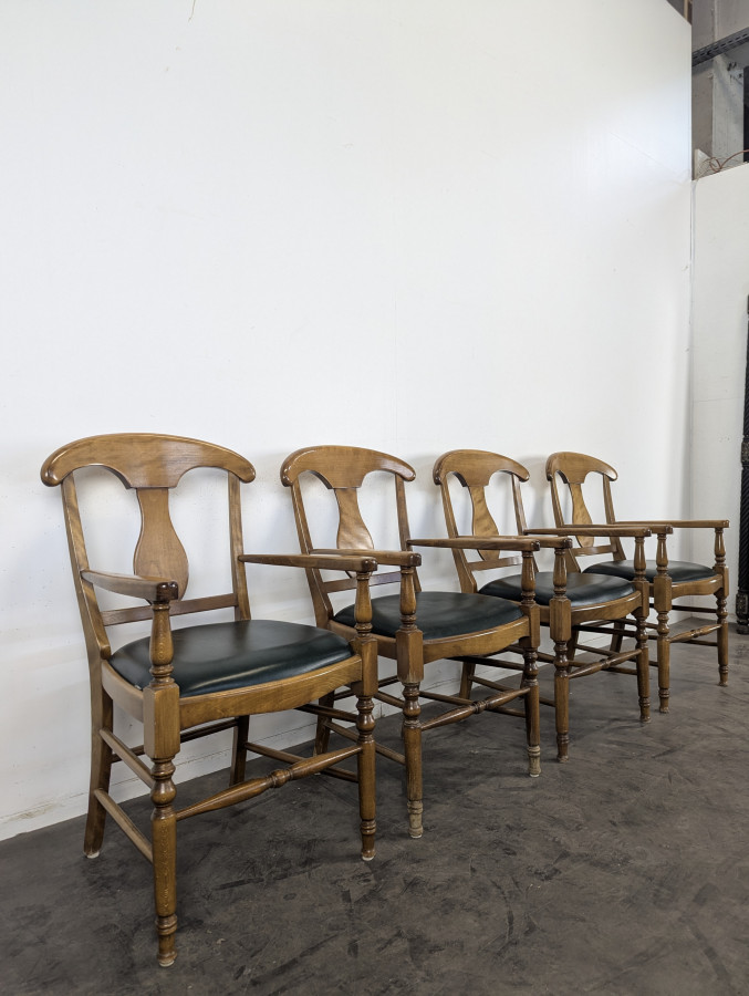 Serie de 4 fauteuils de style directoire à dossier en palmette