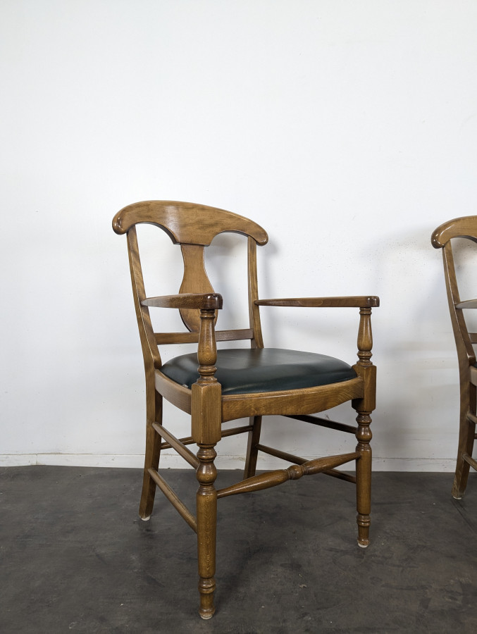 Serie de 4 fauteuils de style directoire à dossier en palmette
