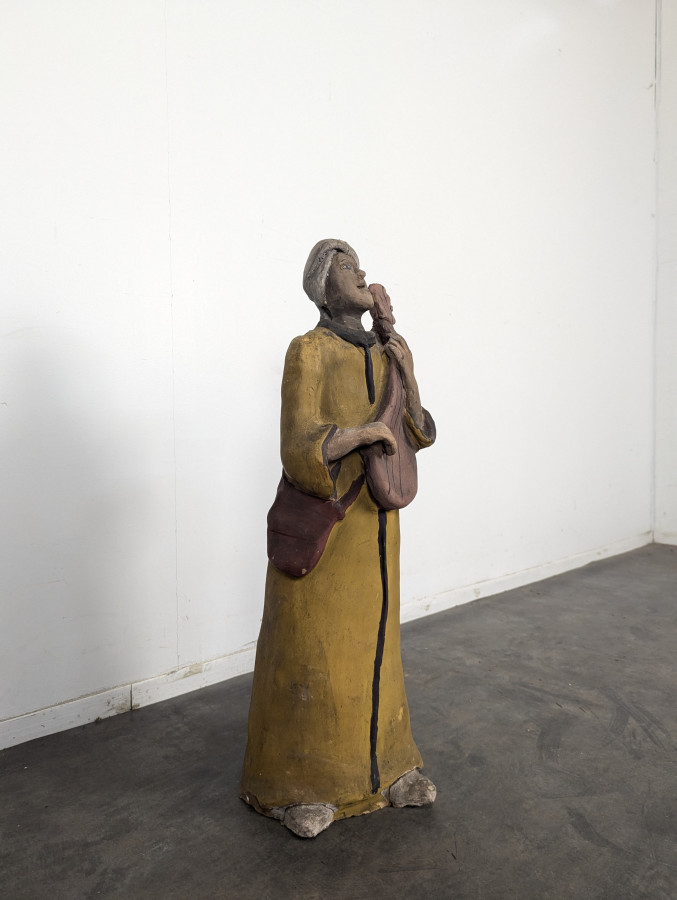 Statue orientale joueur de mandoline