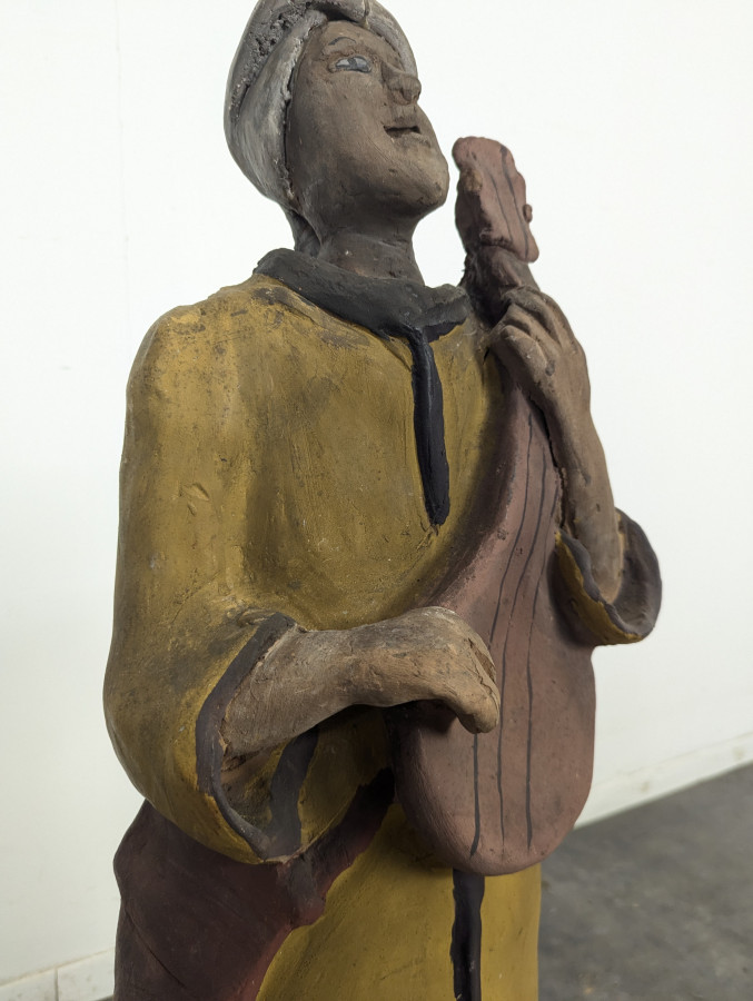 Statue orientale joueur de mandoline