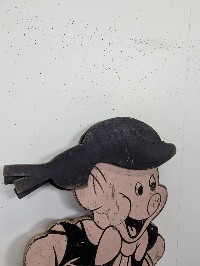 Paire de silhouettes publicitaires petits cochons en bois peint