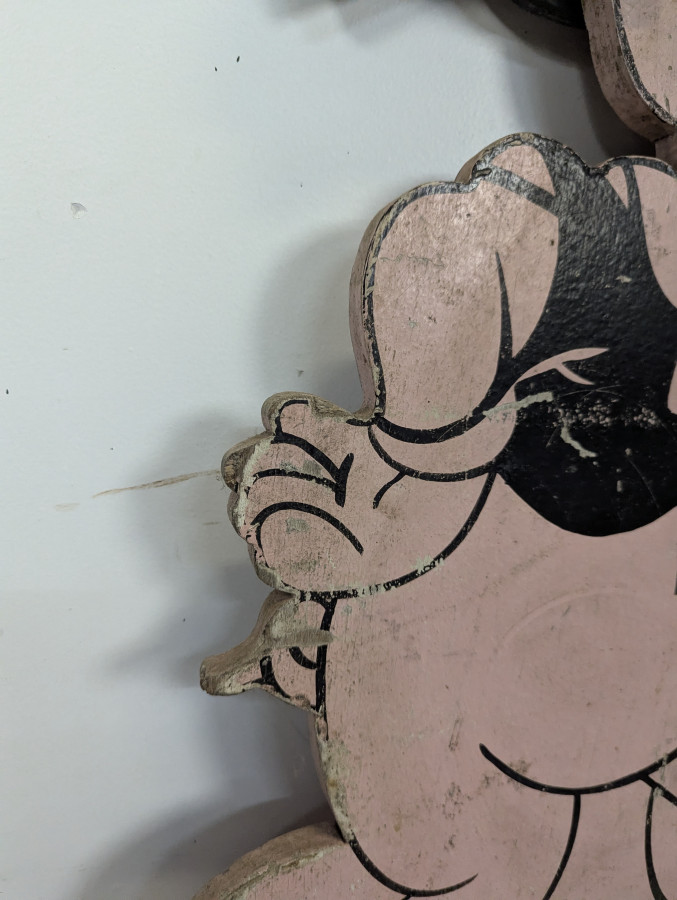 Paire de silhouettes publicitaires petits cochons en bois peint