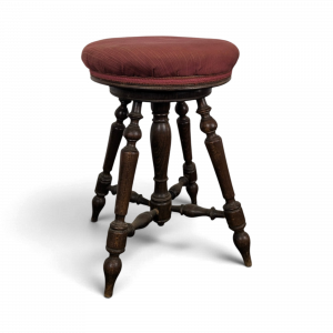 Tabouret de piano à quatre pieds tournés en tissu rose