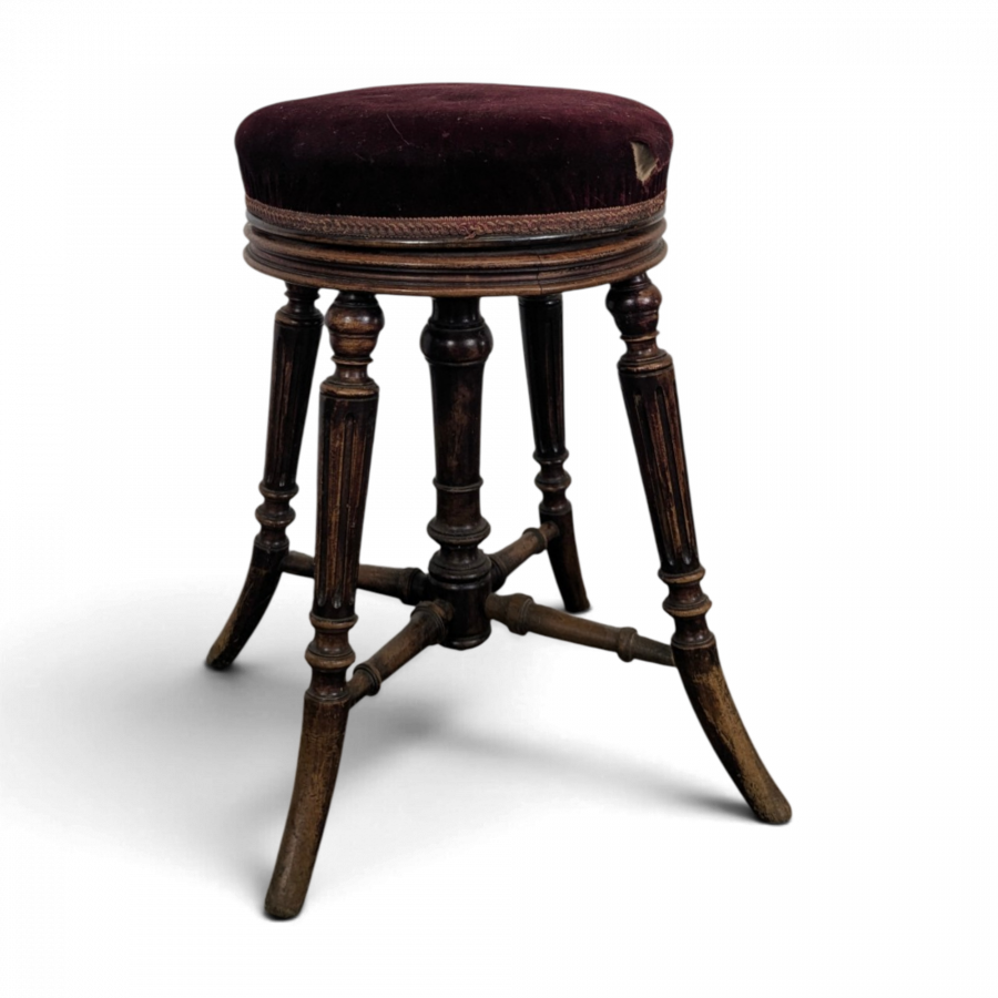 Tabouret de piano en velours bordeaux à quatre pieds