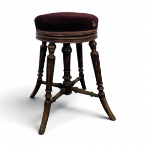 Tabouret de piano en velours bordeaux à quatre pieds