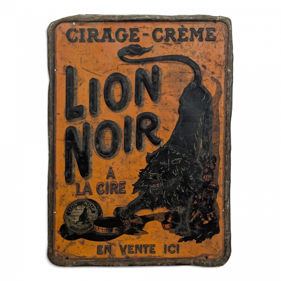 Plaque publicitaire Lion Noir cirage-crème en tôle