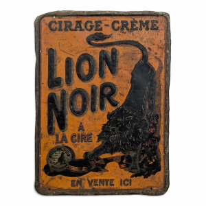 Plaque publicitaire Lion Noir cirage-crème en tôle