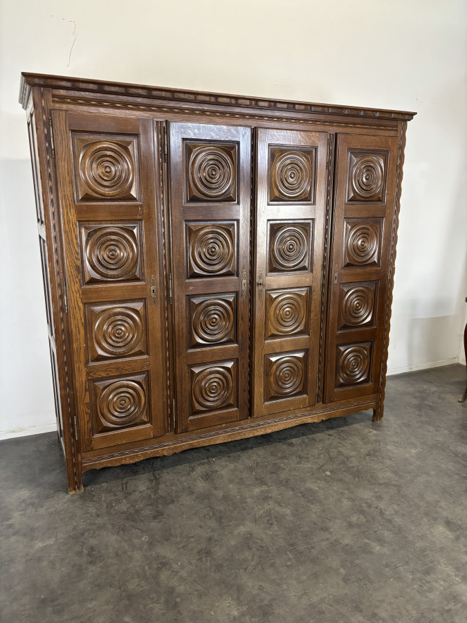 Grande armoire style Charles Dudouyt en chêne