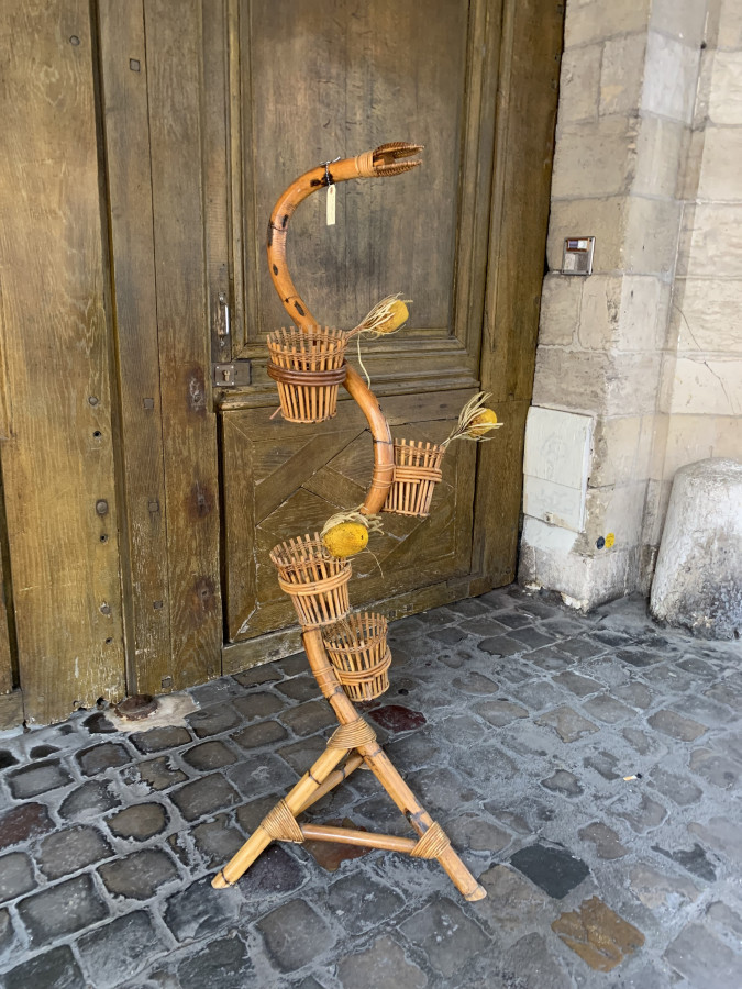Porte plantes serpent en rotin