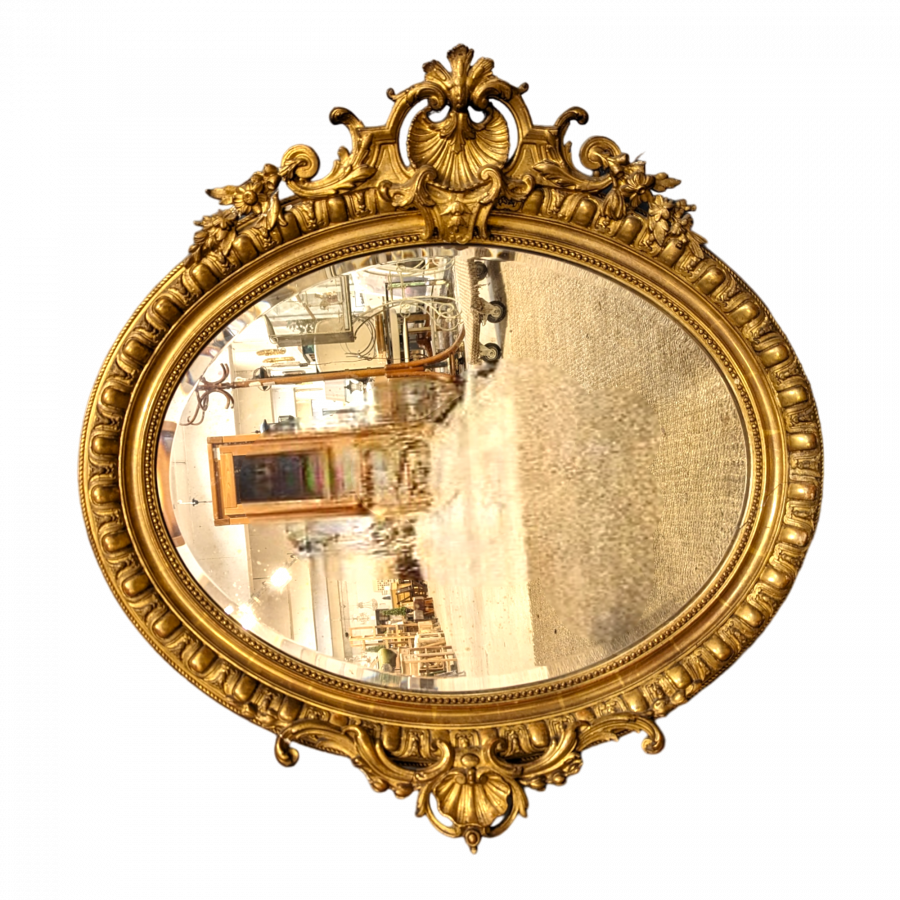 Miroir de style Rocaille Napoléon en bois doré