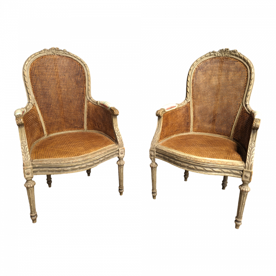 Paire de fauteuils cannés de style Louis XVI