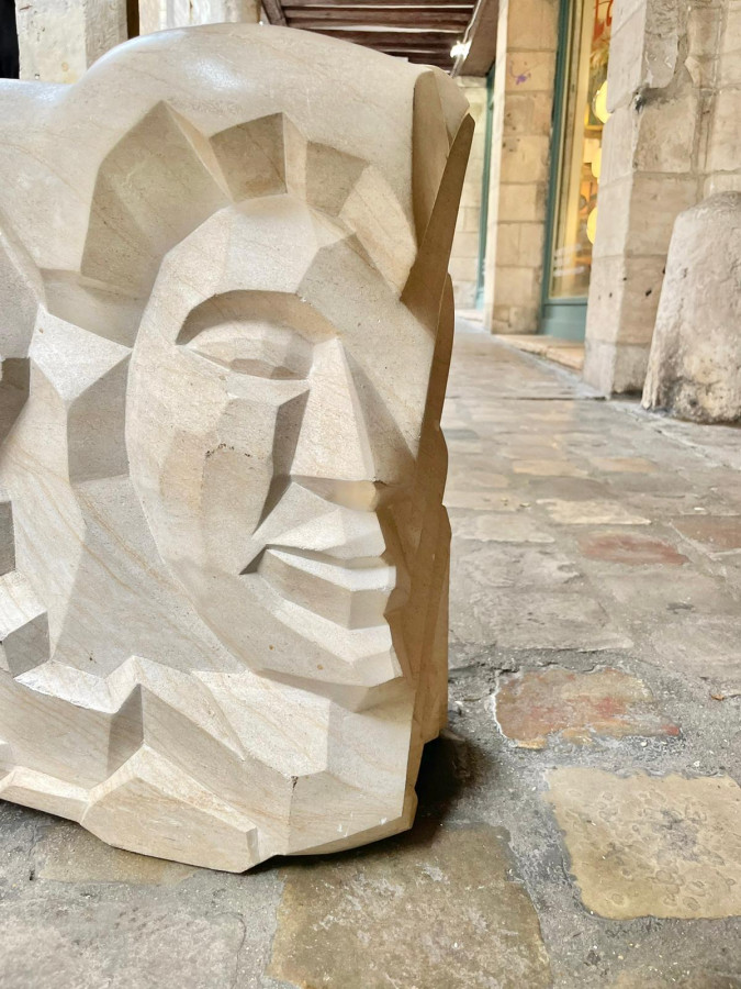 Sculpture de visages de style Art Déco par Lucien Begliomini