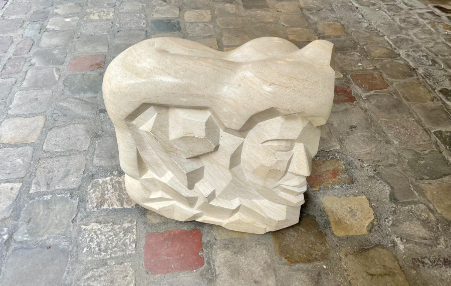 Sculpture de visages de style Art Déco par Lucien Begliomini