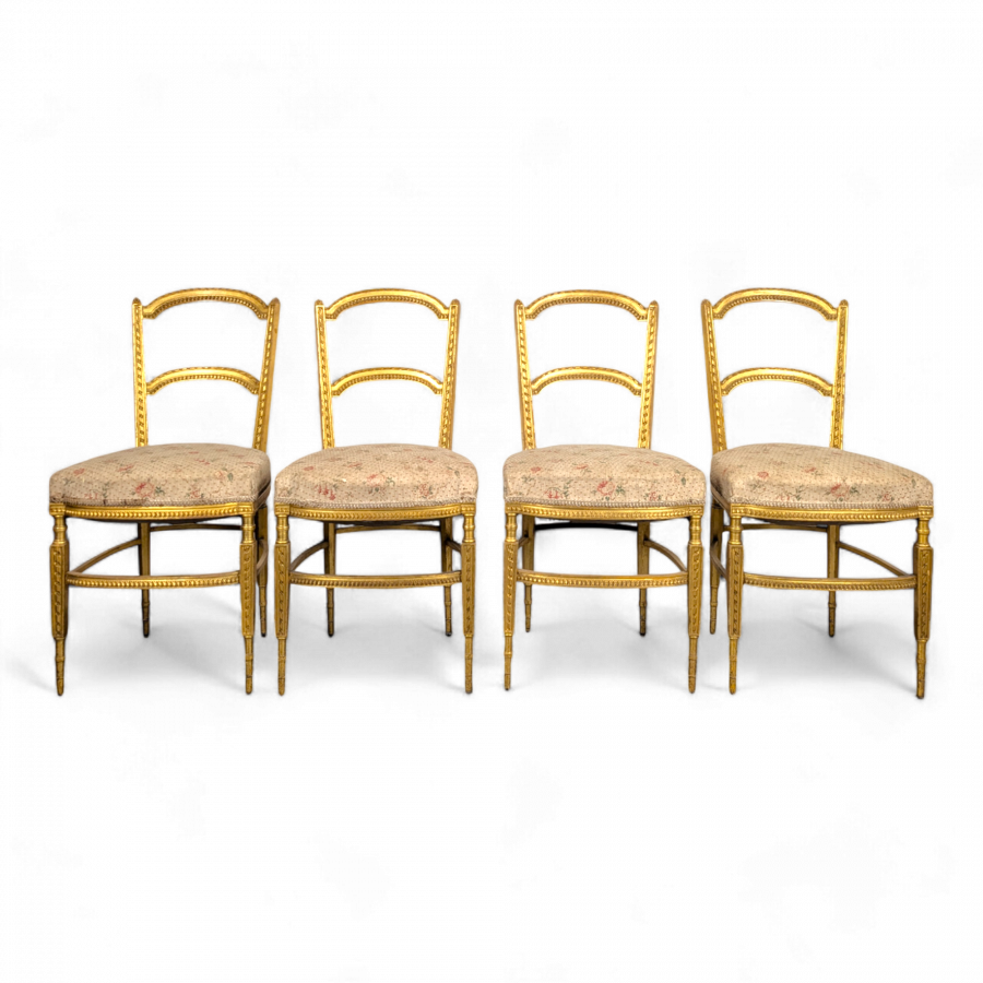 Série de 4 chaises de style Louis XVI en bois doré fin XIXe