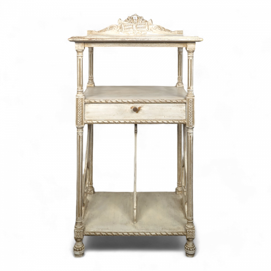 Meuble à musique réchampi de style Louis XVI