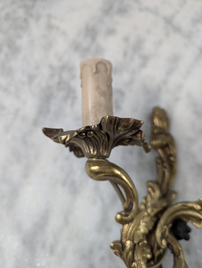 Paire d'applique en bronze de style Louis XV Rocaille