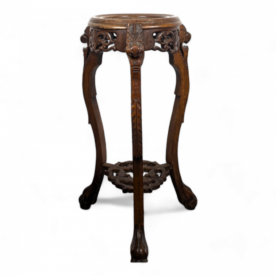 Selette sculptée à décor de chimère