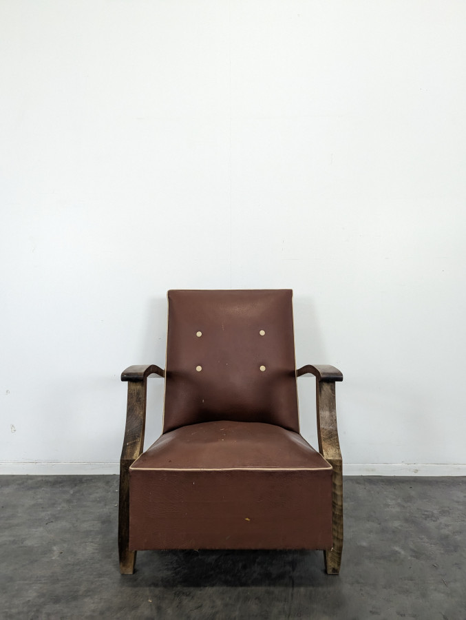Fauteuil en skaï vintage années 50