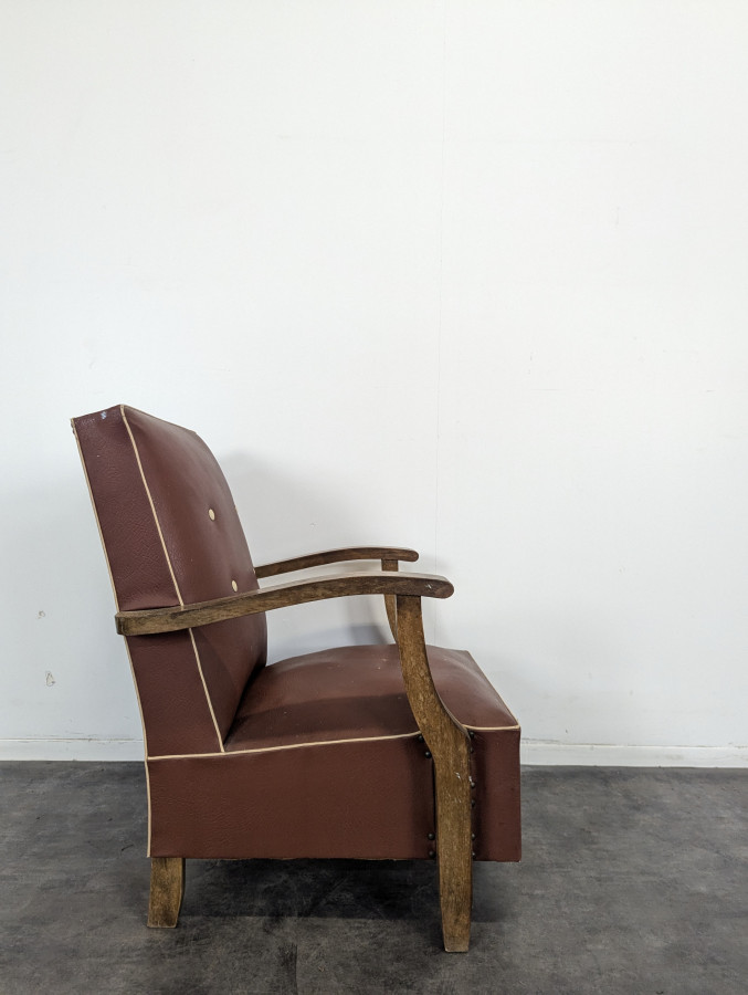 Fauteuil en skaï vintage années 50