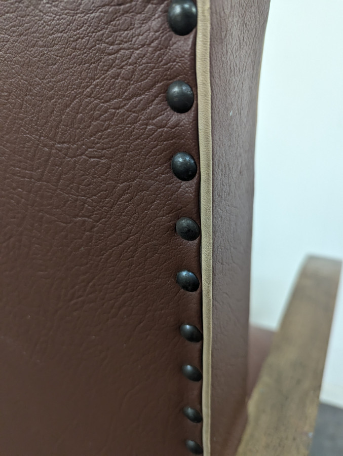 Fauteuil en skaï vintage années 50