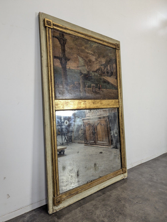 Miroir trumeaux patiné à décors antiques du XIX ème