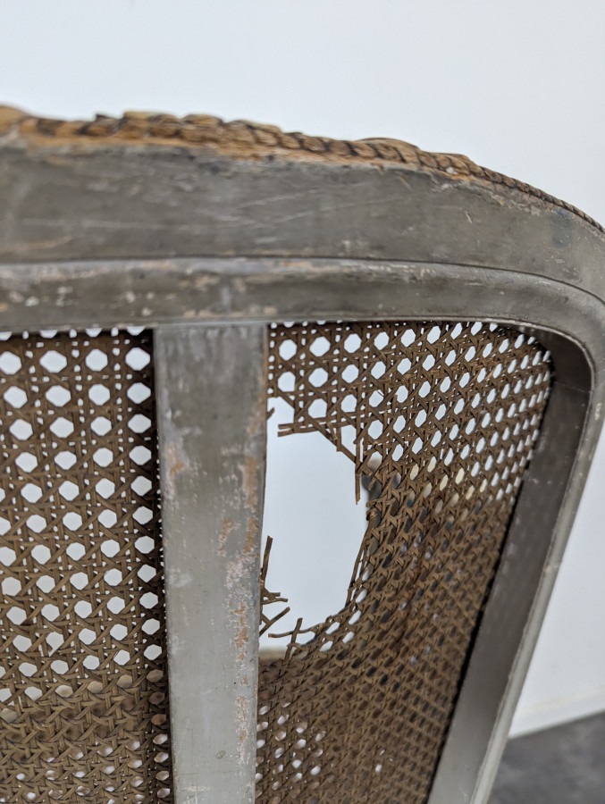 Paire de fauteuils de style Louis XVI patinés