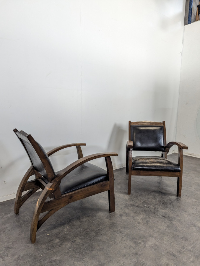 Paire de fauteuils de salon en cuir