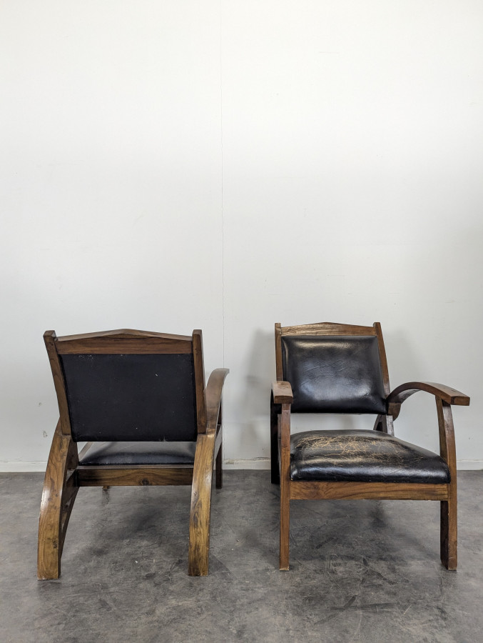 Paire de fauteuils de salon en cuir