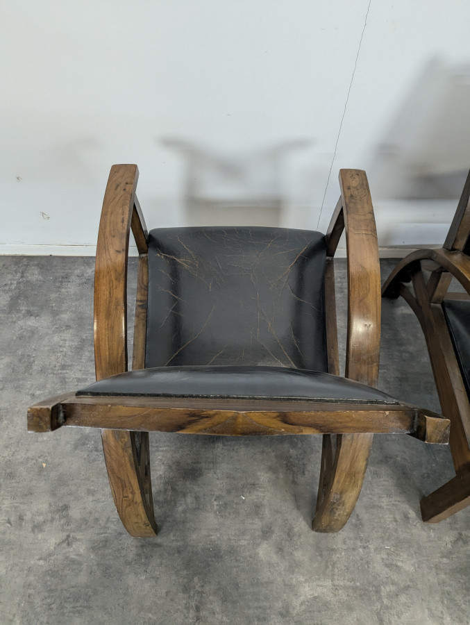 Paire de fauteuils de salon en cuir