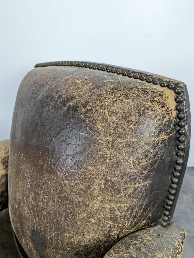 Paire de fauteuils club en cuir