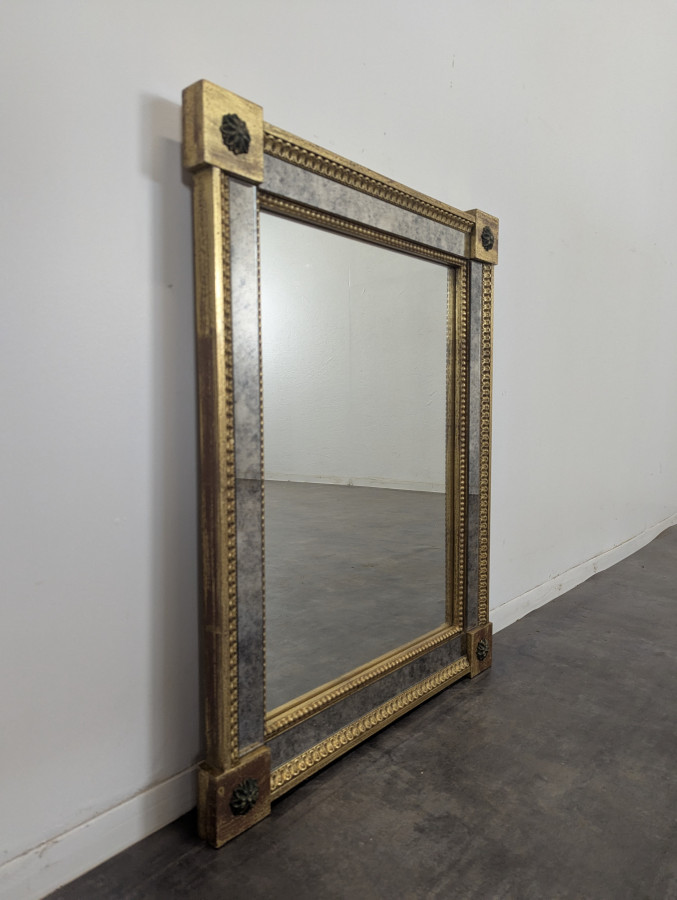 Miroir à parcloses en verre églomisé 20 ème