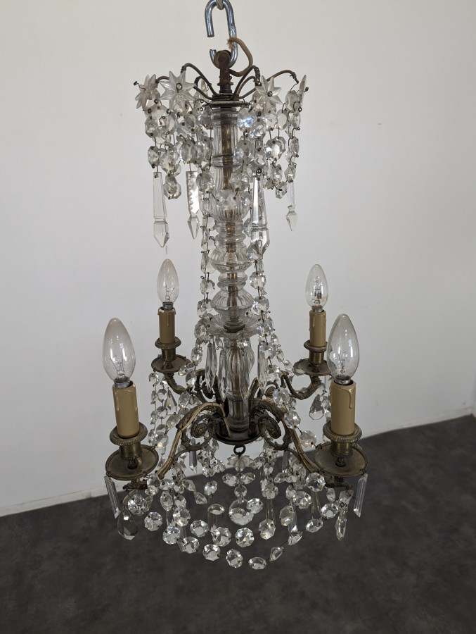 Lustre à pampilles en cristal monture bronze et fût à balustre