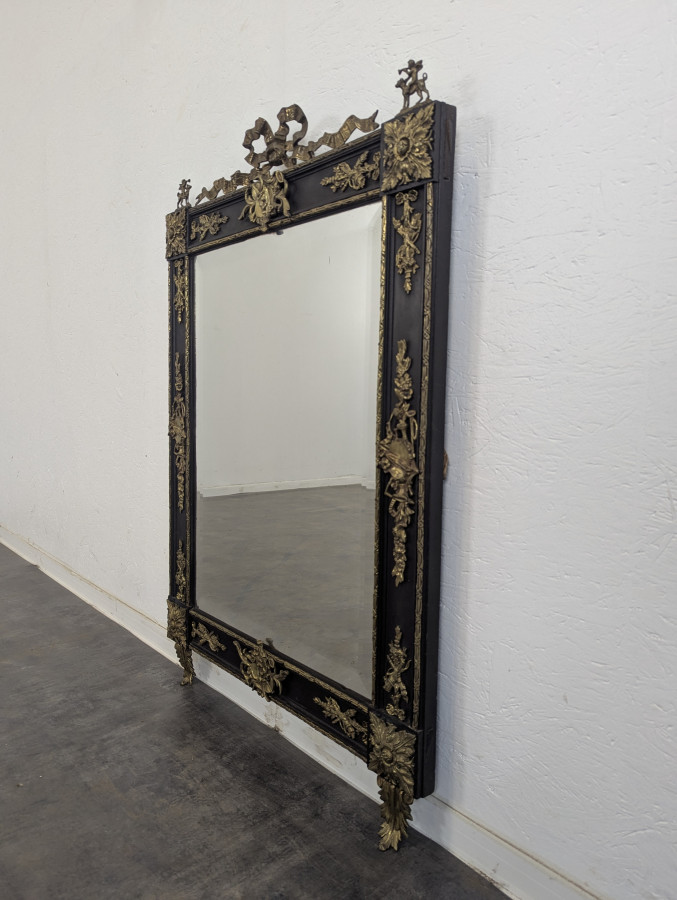 Miroir époque Napoléon III en bois noirci et bronze