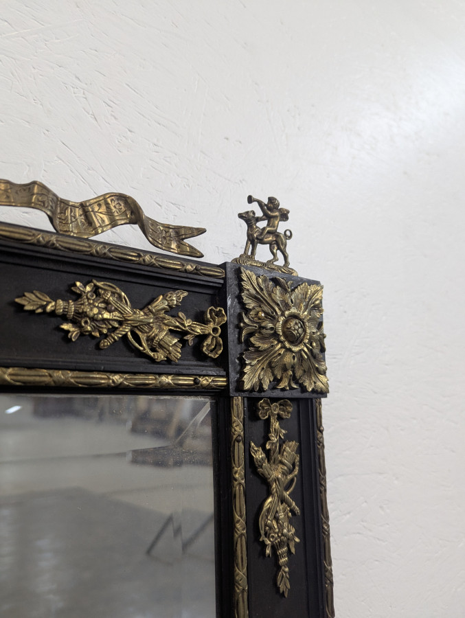 Miroir époque Napoléon III en bois noirci et bronze