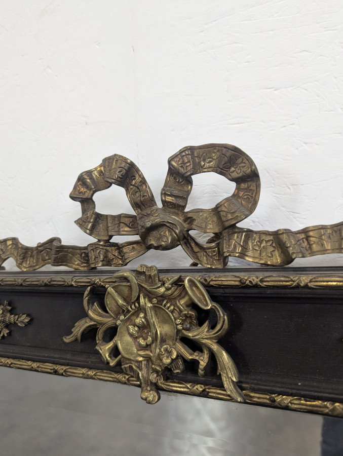 Miroir époque Napoléon III en bois noirci et bronze