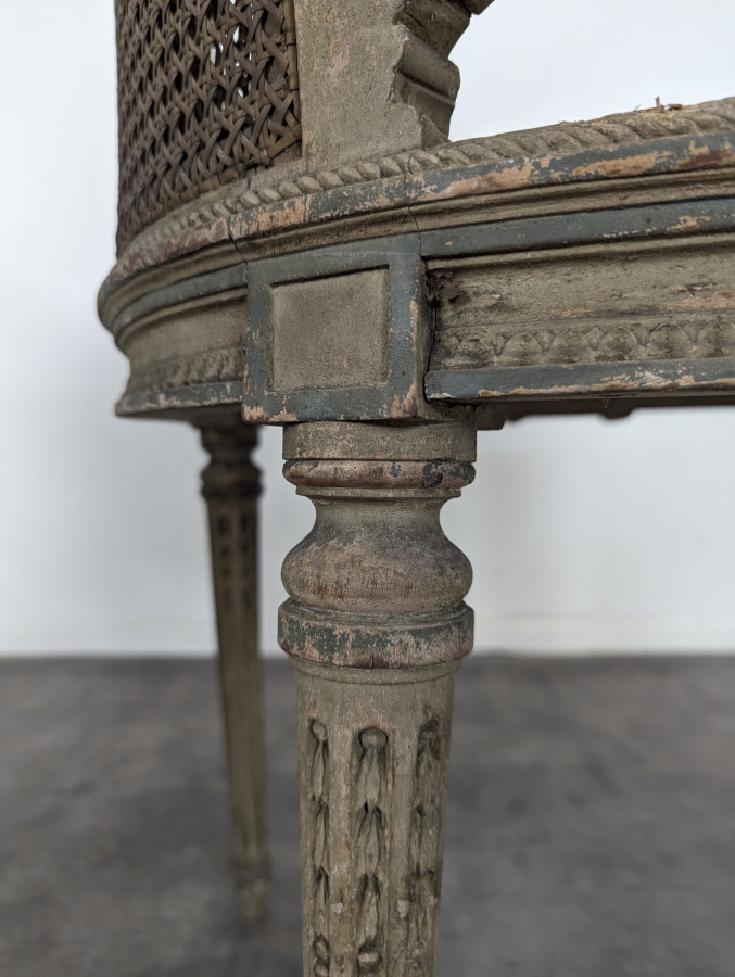 Paire de fauteuil cannés réchampi de style Louis XVI