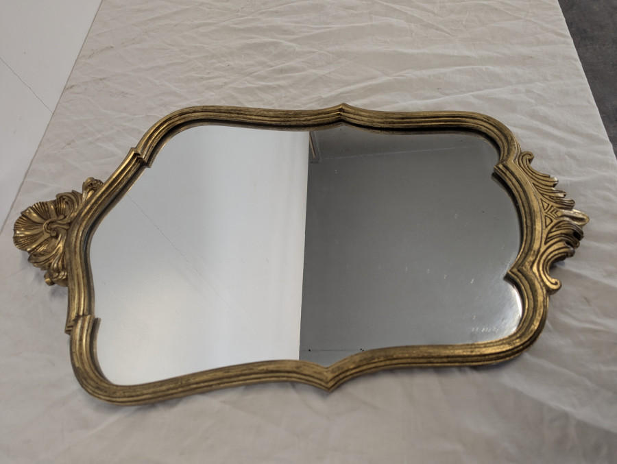Miroir de style Louis XV en bois doré