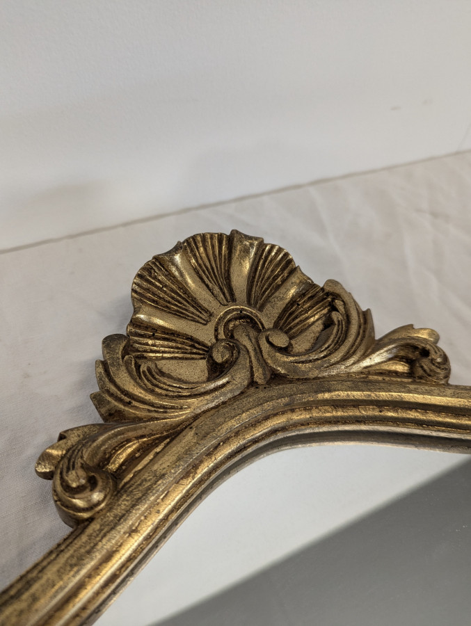 Miroir de style Louis XV en bois doré