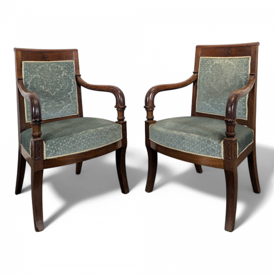 Paire de fauteuils Restauration à pieds sabres