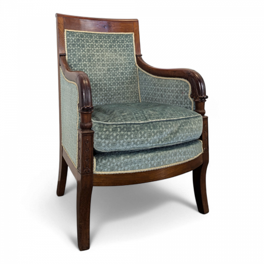 Fauteuil bergère d'époque Restauration à pieds sabres