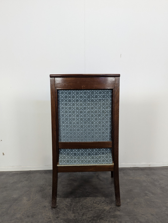Fauteuil bergère d'époque Restauration à pieds sabres