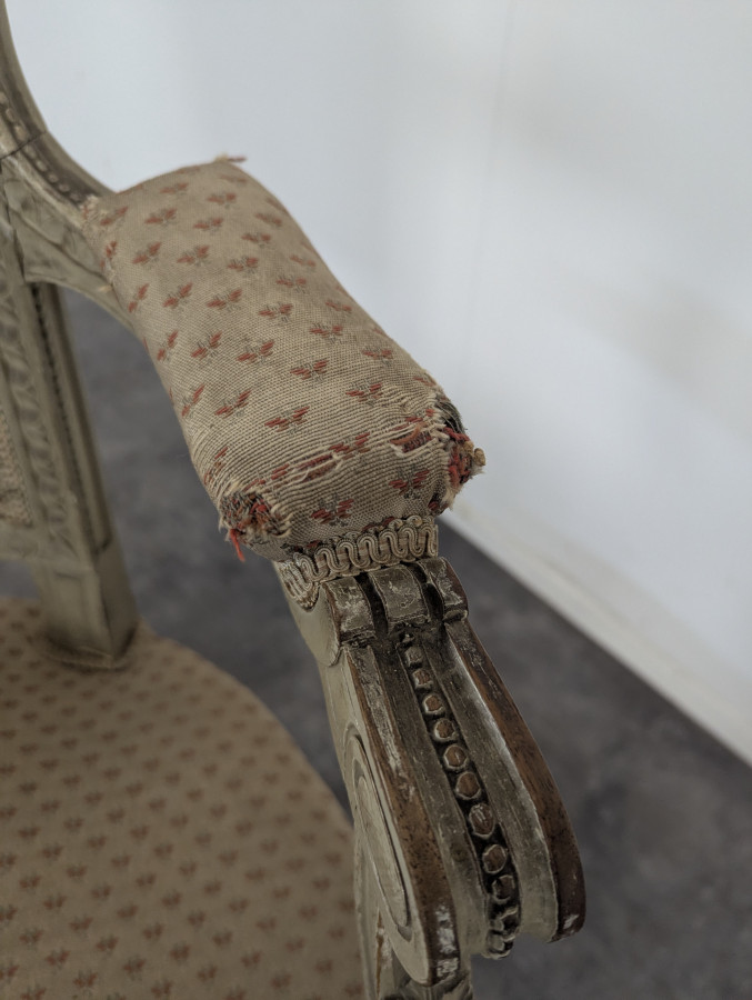 Paire de fauteuil de style Louis XVI réchampis