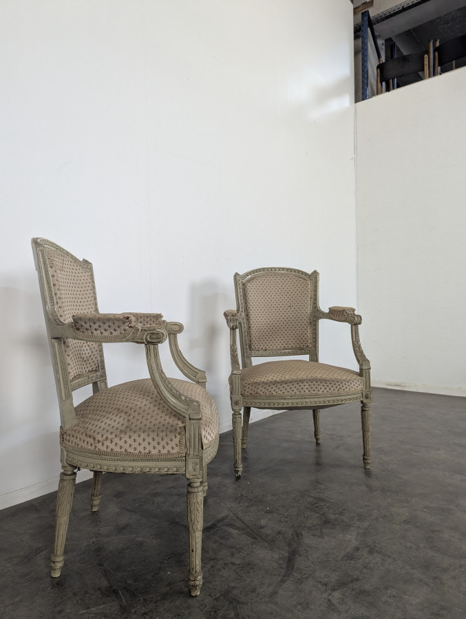 Paire de fauteuil de style Louis XVI réchampis