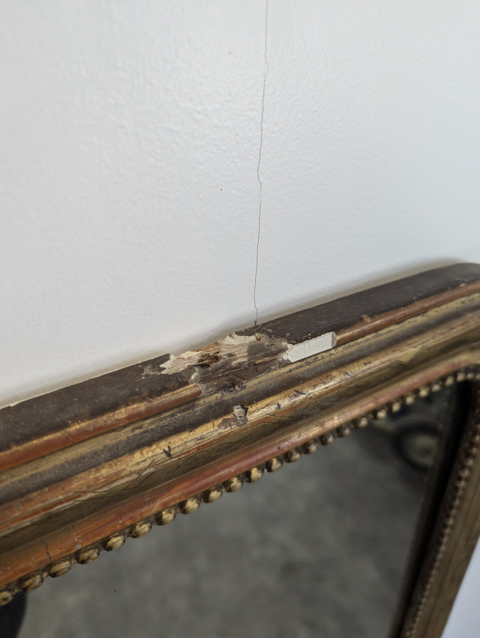 Miroir d'entre-deux en bois doré d'époque Louis Philippe