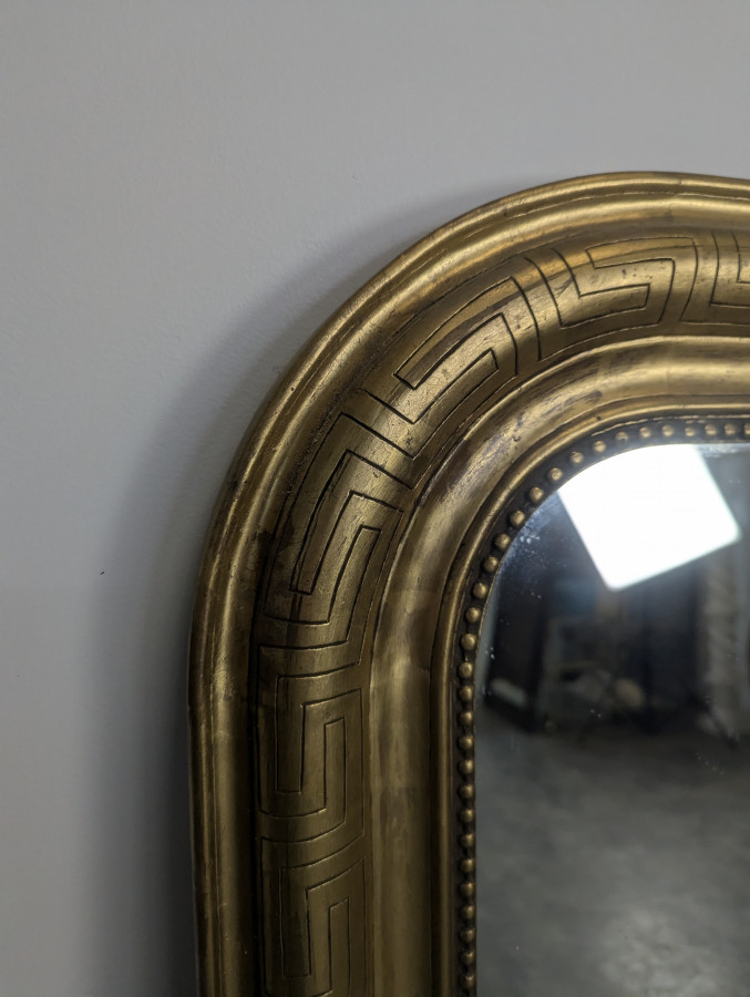 Miroir en bois doré à frise antique époque Louis Philippe