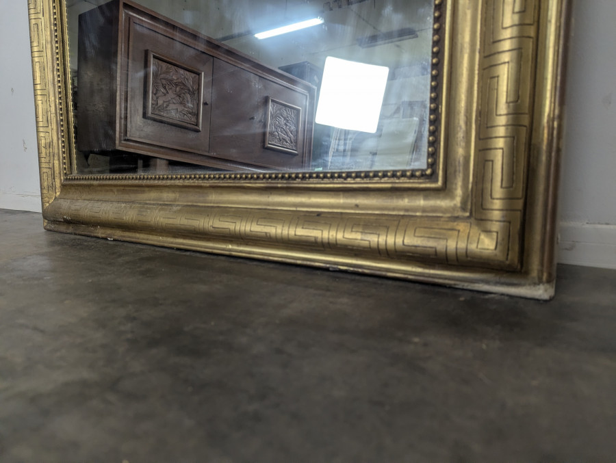 Miroir en bois doré à frise antique époque Louis Philippe