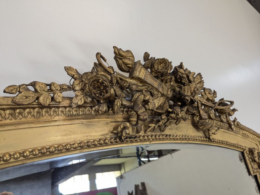 Grand miroir en bois doré de style Louis XVI fin XIXème