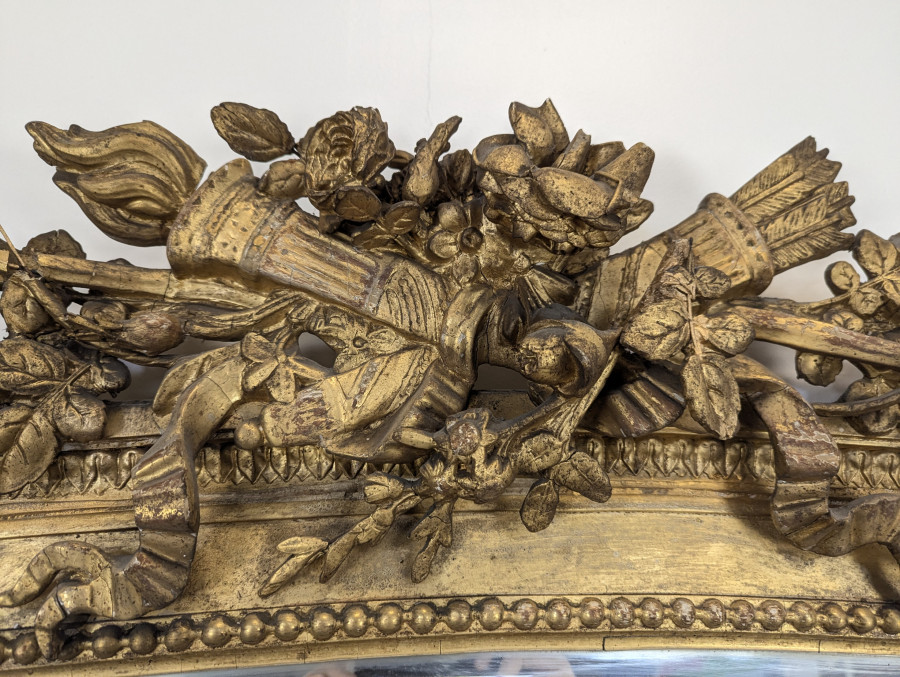 Grand miroir en bois doré de style Louis XVI fin XIXème